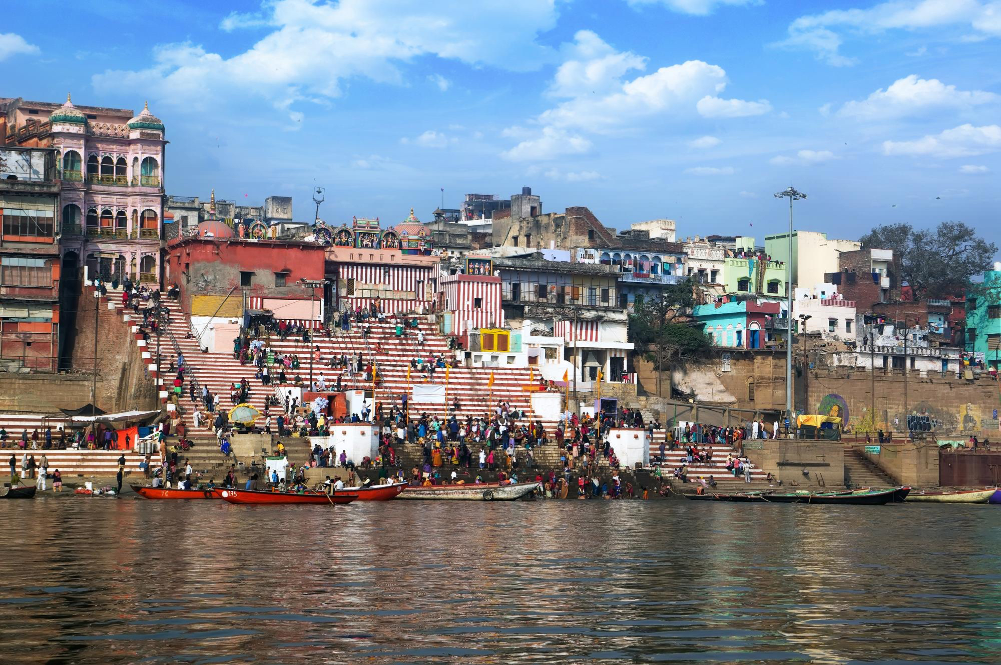 Colorful buildings and ghats along the Ganges in Varanasi